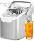 No Sweat Countertop Ice Maker With Rapid Six Minute Freezing And Daily Twenty Six Pound Output showing filled ice basket and drink.