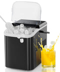 Heavy Duty Countertop Ice Maker With Carry Handle Chilling Bullet Ice Cubes In Six Minutes Cranking Twenty Six Pounds Daily For Weekend Hangouts And Home Bars Smooth Silent Operation with ice cubes and yellow drink.