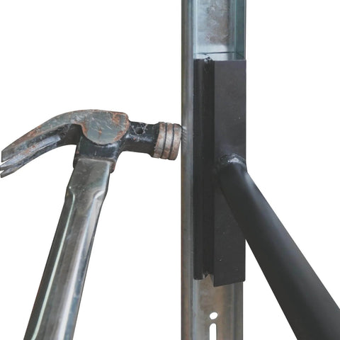 Vertical Track Repair Tool Set for 2 Inch Garage Door Roller Rails Pro Grade Repair Kit being used on metal track with hammer