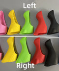 Assorted colorful silicone brake lever hoods for road shifters ST R2000 R3000 R3030, showing left and right pairs on a table.