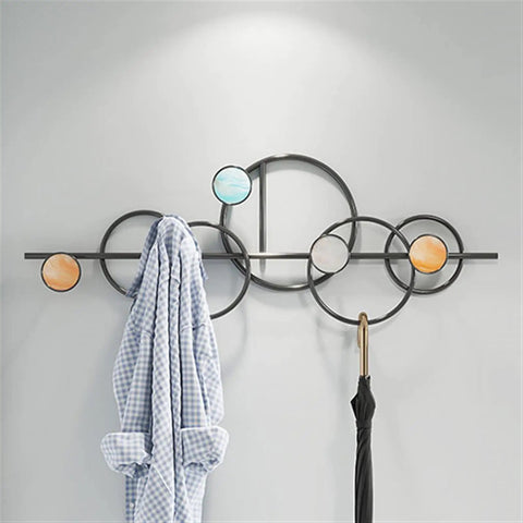 Heavy Duty Metal Wall Mount Coat Hooks For Entryway Living Room Bedroom Sturdy Rack with colorful circles holding a coat.