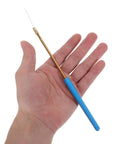 Hand holding metal alloy wire loop from Flame Test Kit For Precise Potassium Identification With Cobalt Glass Filter Sheet And Metal Alloy Wire Loop Reducing Sodium Interference In Chemistry Labs And Science Education