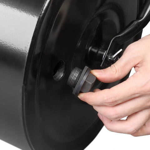 Close-up of filling the Lawn Roller For Seed And Sod Preparation With 10 Gallon Water Fill Capacity And Welded Steel Drum Construction