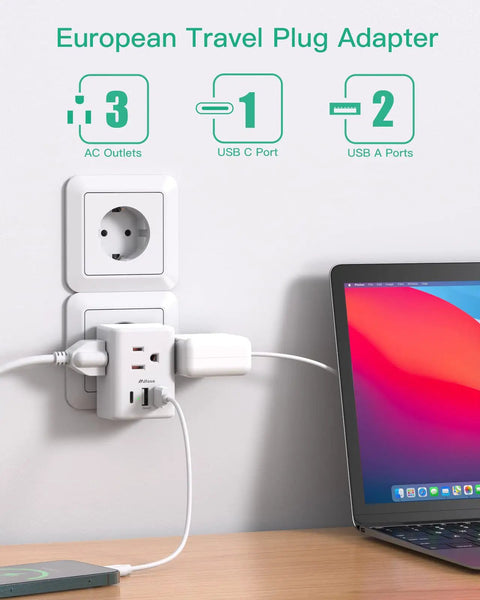 Six In One European Travel Plug Adapter With USB Ports And Type C Power For US To Europe in a wall outlet with laptop
