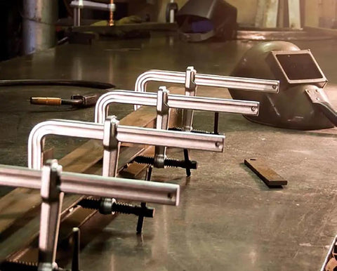 Beefy Heavy Duty F Clamp With Eight Inch Opening And Five And A Half Inch Throat Delivers 2660 Lbs Clamping Force in workshop