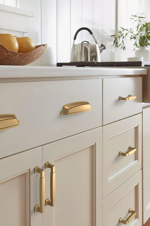 Kitchen view with Stature Champagne Bronze Cabinet Pull 5-1/16 Inch Center-To-Center Drawer Handle for cabinets and furniture installed