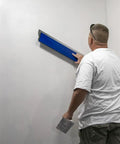 Man using ProSkim Drywall Tool For Ultra Smooth Finish With Lightweight Skimming Blades, Ergonomic Non Slip Handle, Easy Skim Coating, Perfect For DIY And Pros, Made In USA, 31.5 Inch on wall