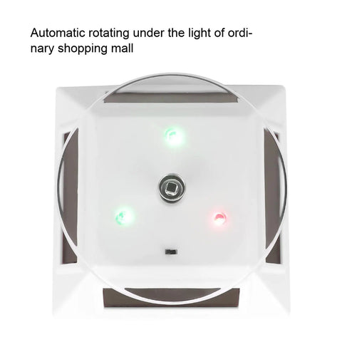 Xhtllo Electric Led Light Solar Powered Rotating Turntable Display Stand For Jewelry Phunique Watches Camera And Decorations top view with lights