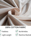 Close-up of 100% cotton fabric promoting fade resistance, lightweight, wrinkle-free, and machine washable properties.