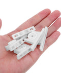 30 Piece Set Plastic Cabinet Door Ball Catches With Screws For Secure Silent Closure held in hand showing detail