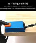 Close-up of the Pocket Hole Jig Kit 14 Piece Set with 15 Degree Dowel Drill clamped on wood for angle drilling holes.