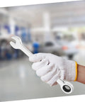 Hand holding a wrench from the Compact Metric Ratcheting Wrench Set With Offset Mini Wrenches 12 Piece Swivel Head Handy Tools Kit.