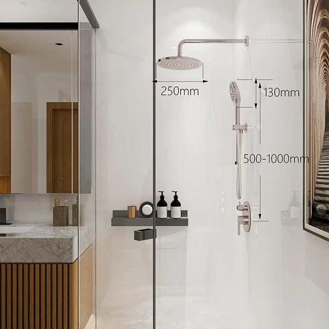 Brushed Nickel Shower Faucet Set Complete Shower System With 6 Inch Rain Shower Head Handheld Spray And High Pressure Rough In Valve Body For A No Brainer Bathroom Makeover installed in a modern bathroom.