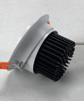 JUDYSSY Adjustable Led Floodlight 3-15W High Efficiency Cob Ceiling Light side view showing cooling fins and clip.
