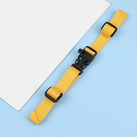 Yellow adjustable chest strap for backpacks with quick release buckle, durable nylon fastener, outdoor shoulder strap.