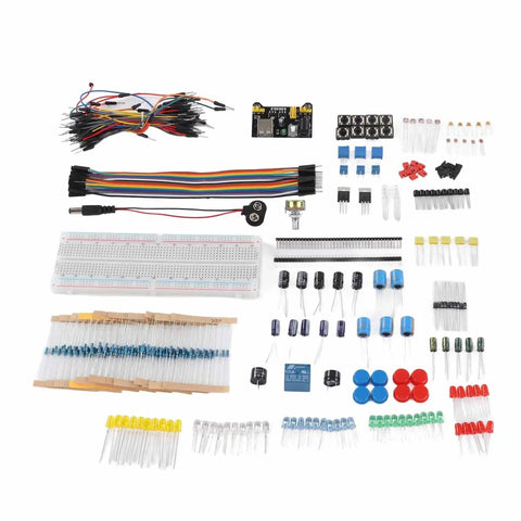 Starter Electronics Component Kit With Resistor Capacitor Diode Modules For Beginners laid out on white surface.