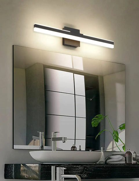 Black LED Vanity Light Over Mirror Wall Mount 15.7 Inch Dope Sleek Adjustable Modern Fixture For Bathroom 14W 3000K Warm White With Frosted Acrylic Shade And Aluminum Body illuminating bathroom mirror.