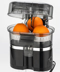 500Ml Electric Citrus Juicer Machine With High Speed 18000 Rpm Motor For Fresh Orange Lemon Grapefruit Juice Extractor Auto Squeeze Pressing with whole oranges inside.
