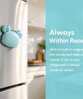 Crab Shaped Bottle Opener 4 In 1 Multi Tool With Magnetic Fridge Magnet box cutter and mini scissors on a kitchen fridge.