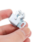 Close-up of hand holding a piece from the 35Pcs Door Ball Catch Cabinet Hardware Kit With Cold Rolled Steel Double Roller Latches For Quiet Operation.