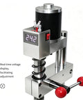 Badass Mini Bench Drill Press Kit With Smooth 24 Volt Seven Speed shows digital display for voltage adjustment on metal build.