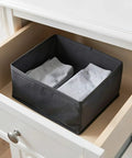 Super Sturdy Foldable Drawer Clothing Organizer Set Eight Piece Gray Fabric Wardrobe Dividers with organized gray socks in drawer.