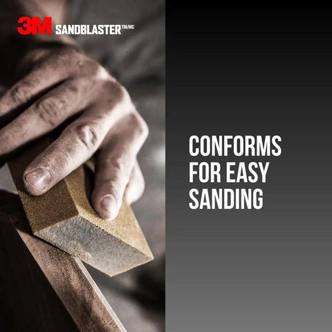 Hand using Dual Angle Sanding Sponge 320 Grit for wet or dry use on wood, angled sides for detail work, by 3M SandBlaster
