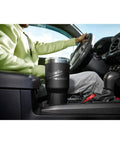 Person in car with Packout Insulated Tumbler 890 Ml Black With Two Wall Vacuum Insulation That Keeps Beverages Hot or Cold.