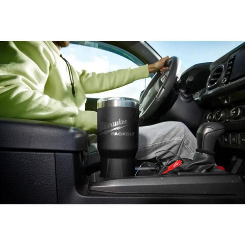Person in car with Packout Insulated Tumbler 890 Ml Black With Two Wall Vacuum Insulation That Keeps Beverages Hot or Cold.