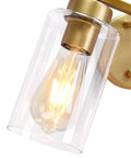 Close-up of brass gold bathroom vanity light with glass shade, showcasing bulb detail. Focus keyword: Two Light Brass Gold Bathroom Vanity Lights Over Mirror With Glass Shades Modern Curved Wall Sconce Fixtures For Home Bath Brighten Your Space With Lit Luxe Style And Easy Mounting.