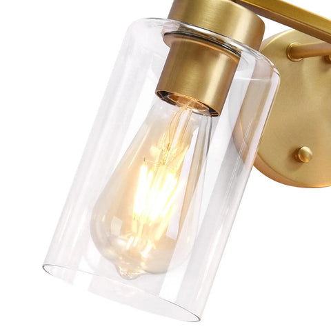 Close-up of brass gold bathroom vanity light with glass shade, showcasing bulb detail. Focus keyword: Two Light Brass Gold Bathroom Vanity Lights Over Mirror With Glass Shades Modern Curved Wall Sconce Fixtures For Home Bath Brighten Your Space With Lit Luxe Style And Easy Mounting.