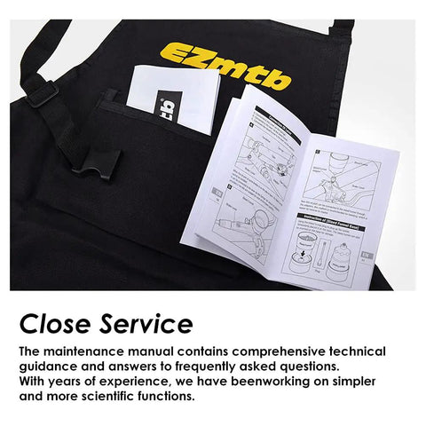 All-In-One Hydraulic Disc Brake Bleed Kit manual with maintenance guidance on black apron.