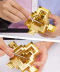 Person using tool from 6 Piece Metal Model Tools Set For DIY 3D Puzzles With Edge Bend And Tab Bend Tools Plus Cylinder Cone Bend Aids