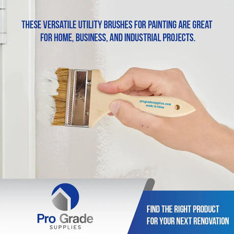 Hand using 24 Pack 4 Inch Chip Paint Brushes With Disposable Natural China Bristles, Square Trim, Solid Wood Handles for painting a wall.