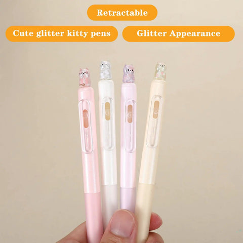 Four Cute Retractable Gel Pens with Glitter Cat Design, 0.5mm Fine Point Black Ink in hand, pink, green, yellow, and purple