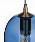 Close-up of Dope Capri Blue Glass Pendant Lights Hand Blown Organic Globe With Gold Accents For Kitchen Island Ceiling Fixtures 8 Inch Height Set Of 2 Easy Install ETL Certified.