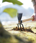 Forged Garden Hoe And Cultivator Hand Tiller From Classic Japanese Craftsmanship in action during precision weeding and cultivation