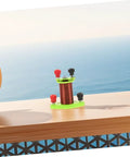 Hands On Induction Coil Kit Two Pack For Physics Lab Dual Coil Transformer Science Set on a wooden table with ocean view