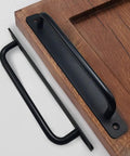 12 Pack Matte Black Cabinet Handles With Base Plate Aluminum Drawer Pulls For Cabinets And Sliding Doors on wood surface.