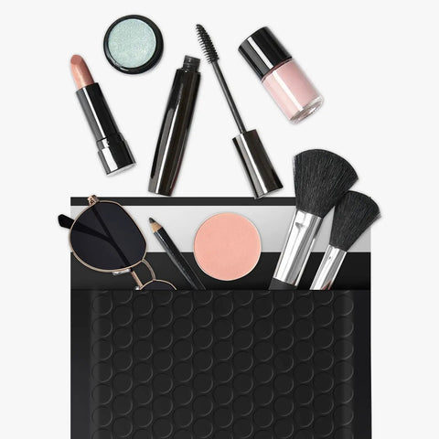 4x7 Inch Padded Self Seal Bubble Mailers Pack Of 100 Opaque Black Waterproof Shipping Envelopes With makeup items displayed