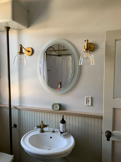 Industrial Vintage Slope Pole Wall Mount Sconce Light Fixture With Six Point Seven Inch Oval Clear Glass Shade In Antique Gold Finish for bathroom