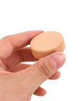 Hand holding Round Beech Wood Cabinet Handle from 4 Pack Circular Drawer Pulls 35mm Single Hole Mount Farmhouse Style Kitchen Cabinet Hardware