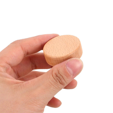 Hand holding Round Beech Wood Cabinet Handle from 4 Pack Circular Drawer Pulls 35mm Single Hole Mount Farmhouse Style Kitchen Cabinet Hardware