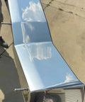 Rad Chrome Paint Pint Kit Featuring 2K Basecoat And 1K Topcoat delivers a shiny chrome finish on a reflective surface outdoors.