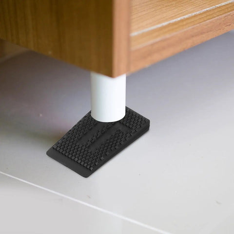 Adjustable Furniture Leveling Shims And No Slip Appliance Stability Pads under table leg to reduce vibration and improve balance.