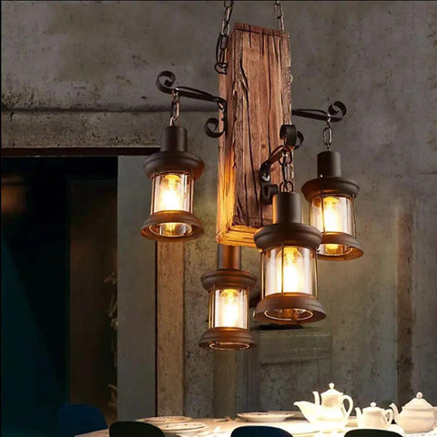 Industrial Vintage Wooden Hanging Pendant Light With Four Lantern Bulbs in a rustic cafe setting.