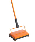 Handheld Electrostatic Carpet And Floor Sweeper In Deep Orange For Effortless Crumb Swipes And Daily Dust Pickup grabbing dust easily.