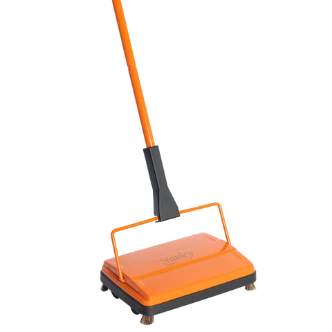 Handheld Electrostatic Carpet And Floor Sweeper In Deep Orange For Effortless Crumb Swipes And Daily Dust Pickup grabbing dust easily.