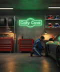 Custom Garage Neon Sign With Handmade Personalization Dimmable LED Wall Light For Home Workshop Carport Or Man Cave Perfect Gift For Dad Birthday Christmas 3D Art Look And Eye Catching Glow above a car in a garage setting.