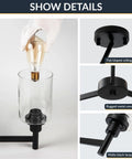 Close-up of 6-light Industrial Glass Cylinder Pendant Chandelier in Black, showing metal construction and glass cylinder shade.